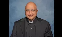 Indian origin Catholic priest US Kansas Arul Carasala