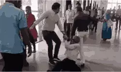 In the viral video, two men can be seen holding the hands of a elderly man and dragging him in mp hospital