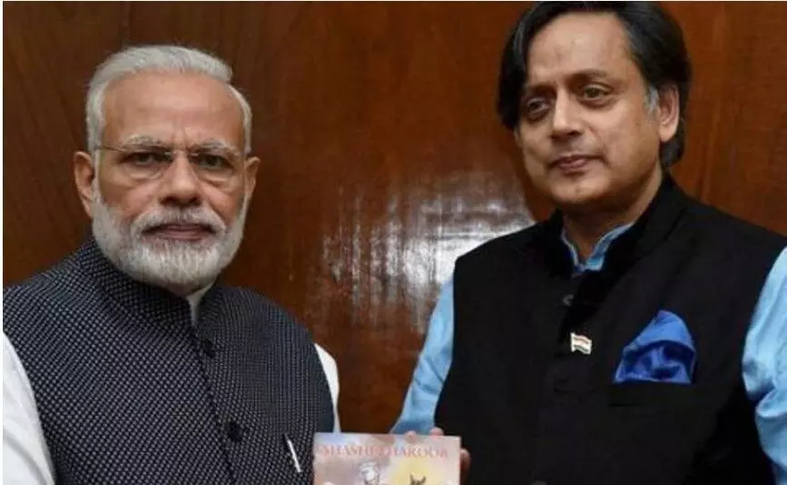 shashi tharoor with pm modi a file photo shashi tharoor with pm modi a file photo