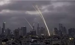Israeli Iron Dome air defense system fires to intercept projectiles over Tel Aviv