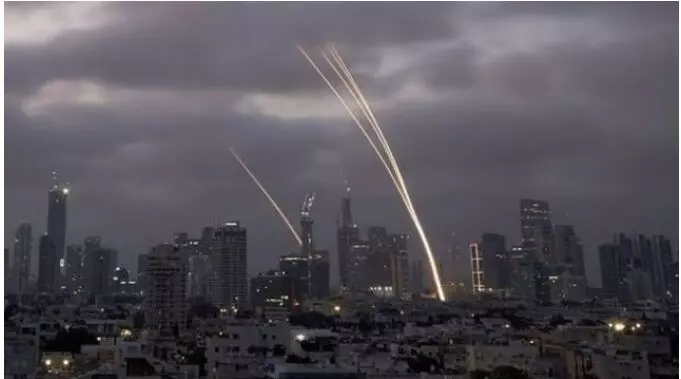 Israeli Iron Dome air defense system fires to intercept projectiles over Tel Aviv Israeli Iron Dome air defense system fires to intercept projectiles over Tel Aviv