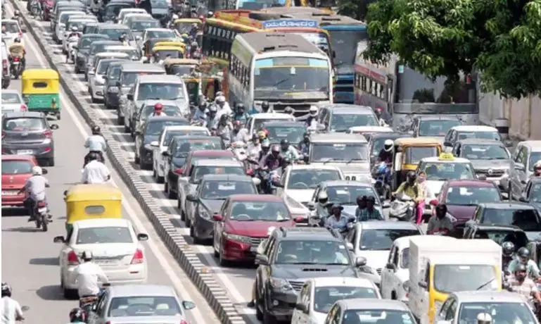 A file photo of slow-moving traffic in Bengaluru.
